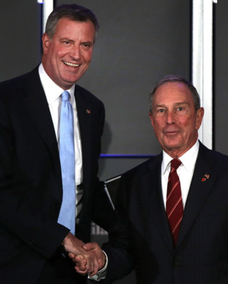 NEW YORK, NY - OCTOBER 08: Democratic nominee for New York Mayor Bill de Blasio (L) appears on stage with current New York Mayor Michael Bloomberg at