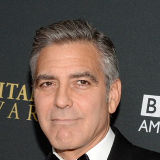 BEVERLY HILLS, CA - NOVEMBER 09: Filmmaker George Clooney with Stylebop.com attends the 2013 BAFTA LA Jaguar Britannia Awards presented by BBC America at The Beverly Hilton Hotel on November 9, 2013 in Beverly Hills, California. (Photo by Michael Kovac/Getty Images for BAFTA LA)