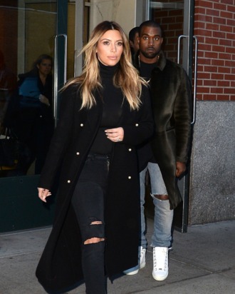 NEW YORK, NY - NOVEMBER 25: Kim Kardashian and Kayne West are seen in Soho on November 25, 2013 in New York City. (Photo by Raymond Hall/FilmMagic)
