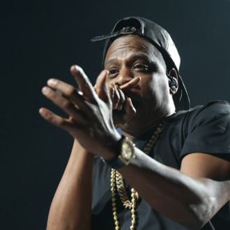 ST. PAUL, MN - NOVEMBER 30: Jay Z performs at Xcel Energy Center on November 30, 2013 in St. Paul, Minnesota. (Photo by Adam Bettcher/Getty Images)