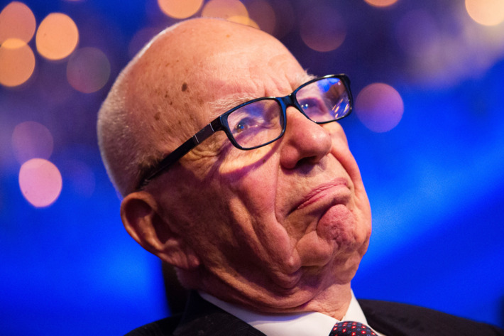 Rupert Murdoch listens to U.S. President Barack Obama make remarks at the Wall Street Journal CEO Council annual meeting, at the Four Seasons Hotel, on November 19, 2013, in Washington, DC. Obama discussed immigration reform and the health care rollout, among other topics.