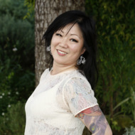 US fashion designer, actress, author, and recording artist Margaret Cho poses during a photocall to promote her new release "Cho Dependent" on October 3, 2011 in Cannes, southern France, during the international MIPCOM audiovisual trade show. AFP PHOTO SEBASTIEN NOGIER (Photo credit should read SEBASTIEN NOGIER/AFP/Getty Images)