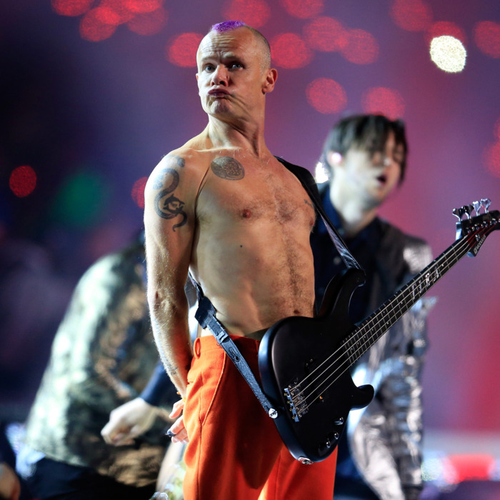 Flea of the Red Hot Chili Peppers performs during the Pepsi Super Bowl XLVIII Halftime Show at MetLife Stadium on February 2, 2014 in East Rutherford, New Jersey.