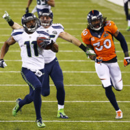 EAST RUTHERFORD, NJ - FEBRUARY 02: Wide receiver Percy Harvin #11 of the Seattle Seahawks returns the second half kickoff for 87 yards during the Pepsi Super Bowl XLVIII Halftime Show at MetLife Stadium against the Denver Broncos on February 2, 2014 in East Rutherford, New Jersey. (Photo by Tom Pennington/Getty Images)