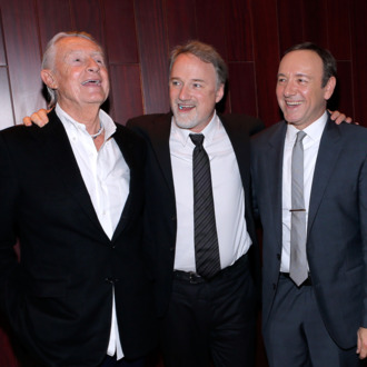NEW YORK, NY - JANUARY 30: (L-R) Director Joel Schumacher, producer David Fincher and actor Kevin Spacey attend Netflix's