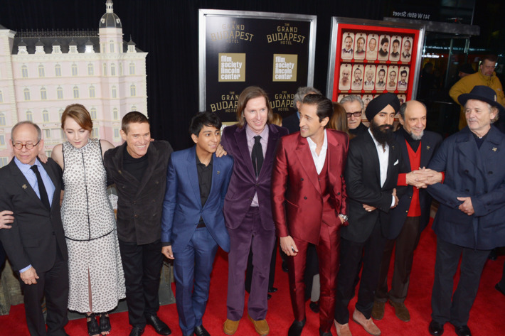 NEW YORK, NY - FEBRUARY 26: (L-R) Actors/castmembers Bob Balaban, Saoirse Ronan, Willem Dafoe, Tony Revolori, filmmaker Wes Anderson, and actors/castmembers Harvey Keitel, Adrien Brody, Waris Ahluwalia, F. Murray Abraham and attend the "The Grand Budapest Hotel" New York Premiere at Alice Tully Hall on February 26, 2014 in New York City. (Photo by Michael Loccisano/WireImage)