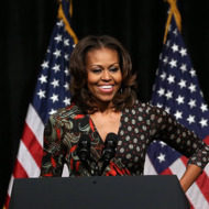 WASHINGTON, DC - NOVEMBER 12: First lady Michelle Obama speaks to students about higher education during an event at the Bell Multicultural High School, November 12, 2013 in Washington, DC. The first lady told students to commit to their education so that they can create a better future for themselves and their country. (Photo by Mark Wilson/Getty Images)