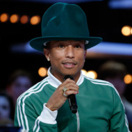 US singer Pharrell Williams looks on as he takes part in the "Le Grand Journal" TV show at the headquarters of the French television channel Canal Plus in Paris, on February 24, 2014. AFP PHOTO / THOMAS SAMSON (Photo credit should read THOMAS SAMSON/AFP/Getty Images)