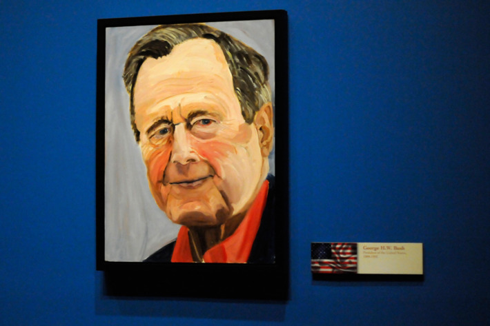 04 Apr 2014, Dallas, Texas, USA --- A portrait of former President George H.W. Bush painted by his son former President George W. Bush, which is part of the exhibit "The Art of Leadership: A President's Diplomacy," is on display at the George W. Bush Presidential Library and Museum in Dallas, Friday, April 4, 2014. The exhibit of portraits of world leaders painted by Bush opens Saturday and runs through June 3. (AP Photo/Benny Snyder) --- Image by ? Benny Snyder/AP/Corbis