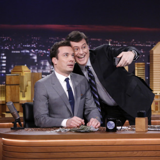 THE TONIGHT SHOW STARRING JIMMY FALLON -- Episode 0001 -- Pictured: (l-r) Host Jimmy Fallon and comedian Stephen Colbert on February 17, 2014 -- (Photo by: Lloyd Bishop/NBC/NBCU Photo Bank)