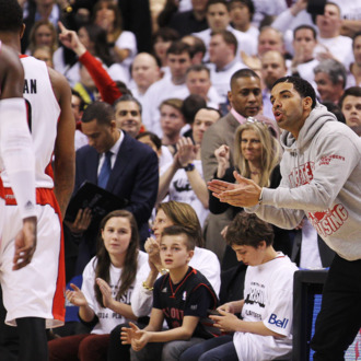 Rap star Drake cheers as the Toronto Raptors take on the Brooklyn Nets in Game Two of the NBA Eastern Conference Quarterfinals at the Air Canada Centre on April 22, 2014 in Toronto, Ontario, Canada. The Raptors defeated the Nets 100-95 to even the series 1-1. TORONTO, ON - APRIL 22: Rap star Drake cheers as the Toronto Raptors take on the Brooklyn Nets in Game Two of the NBA Eastern Conference Quarterfinals at the Air Canada Centre on April 22, 2014 in Toronto, Ontario, Canada. The Raptors defeated the Nets 100-95 to even the series 1-1. NOTE TO USER: user expressly acknowledges and agrees that, by downloading and/or using this Photograph, user is consenting to the terms and conditions of the Getty Images License Agreement. (Photo by Claus Andersen/Getty Images)