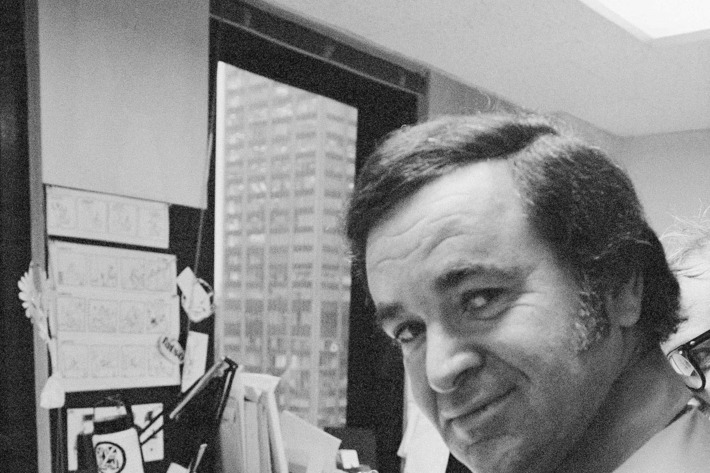 In this 1972 file photo, "Mad" magazine editor Al Feldstein works on page layout in his office at the magazine's New York headquarters. Feldstein, whose 28 years at the helm of Mad transformed the satirical magazine into a pop culture institution, died Tuesday, April 29, 2014. He was 88.
