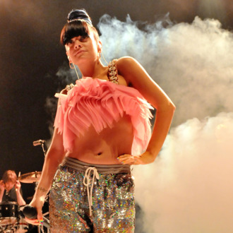 LONDON, ENGLAND - APRIL 28: (EDITORIAL USE ONLY) Lily Allen performs live on stage during the launch for her new album 'Sheezus' at Shepherds Bush Empire on April 28, 2014 in London, United Kingdom. (Photo by Jim Dyson/Redferns via Getty Images)