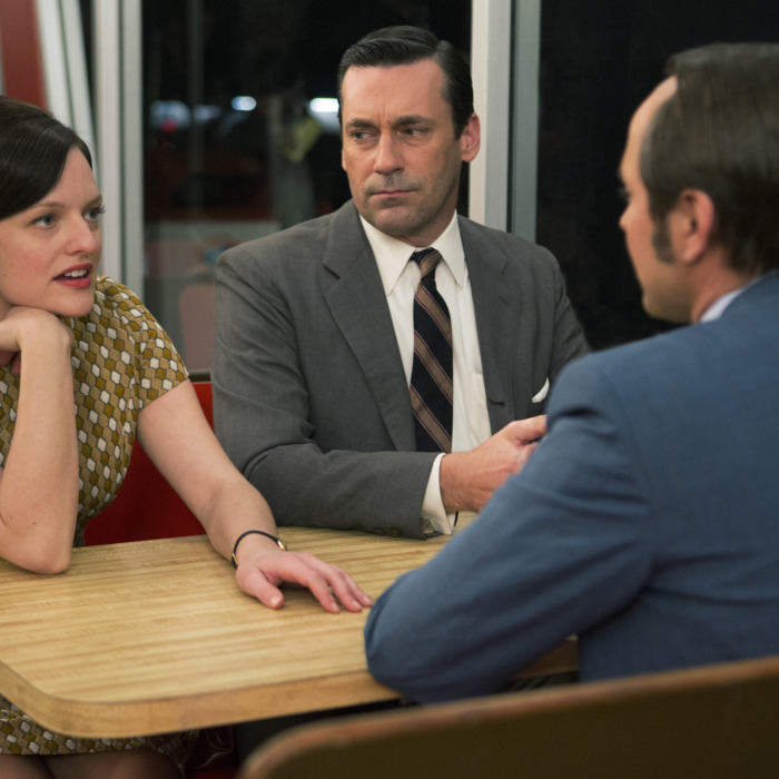 Elisabeth Moss as Peggy Olson, Jon Hamm as Don Draper and Vincent Kartheiser as Pete Campbell - Mad Men _ Season 7, Episode 6 - Photo Credit; Justina Mintz/AMC