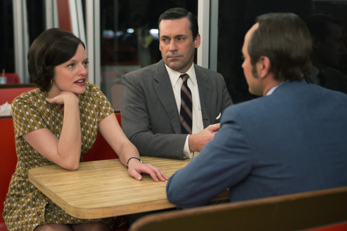 Elisabeth Moss as Peggy Olson, Jon Hamm as Don Draper and Vincent Kartheiser as Pete Campbell - Mad Men _ Season 7, Episode 6 - Photo Credit; Justina Mintz/AMC