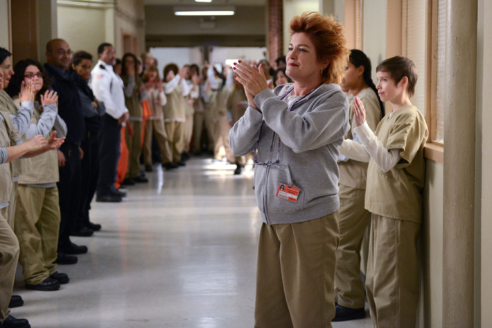 Kate Mulgrew (C) in a scene from Netflix’s “Orange is the New Black” Season 2. Photo credit: Ali Goldstein for Netflix.