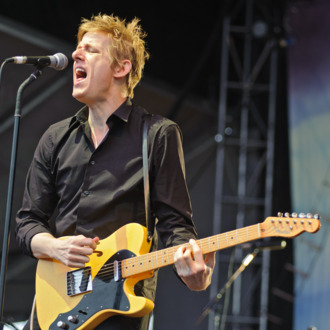 LOUISVILLE, KY - JULY 18: Britt Daniel of Spoon performs during the 2014 Forecastle Music Festival at Louisville Waterfront Park on July 18, 2014 in Louisville, Kentucky. (Photo by Timothy Hiatt/WireImage)