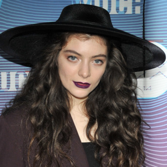 TORONTO, ON - JUNE 15: Singer-songwriter Lorde poses in the press room at the 2014 MuchMusic Video Awards at MuchMusic HQ on June 15, 2014 in Toronto, Canada. (Photo by Sonia Recchia/Getty Images)