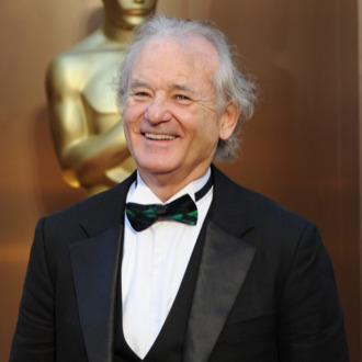 Actor Bill Murray arrives on the red carpet for the 86th Academy Awards on March 2nd, 2014 in Hollywood, California. AFP PHOTO / Robyn BECK (Photo credit should read ROBYN BECK/AFP/Getty Images)
