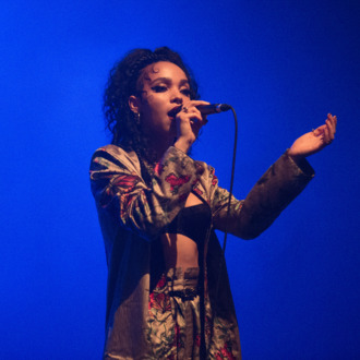 PARIS, FRANCE - APRIL 30: FKA Twigs performs at Le Carreau Du Temple on April 30, 2014 in Paris, France. (Photo by David Wolff - Patrick/Redferns via Getty Images)