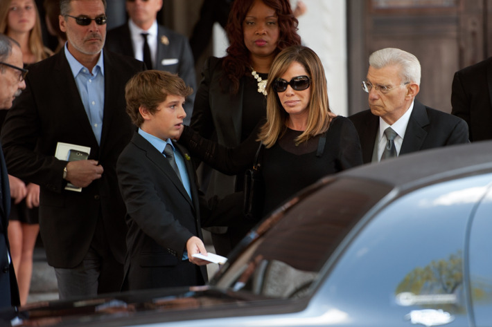 NEW YORK, NY - SEPTEMBER 07: Melissa Rivers (2nd R) and son Cooper Endicott attend the Joan Rivers memorial service at Temple Emanu-El on September 7, 2014 in New York City. Rivers passed away on September 4, 2014 after suffering respiratory and cardiac arrest during vocal cord surgery on August 28, 2014. (Photo by D Dipasupil/Getty Images)
