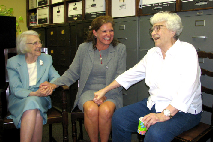 FILE - in this Sept. 11, 2006 file photo, attorney Alice Lee, left, accepts birthday wishes from Monroe County Circuit Judge-elect Dawn Hare, center, and her sister, Pulitzer-winning author Harper Lee, right, in Monroeville, Ala. Alice Lee has died, she was 103. Johnson Funeral Home in Monroeville posted an online obituary saying Lee died Monday, Nov. 17, 2014. . No cause of death was given, and the announcement says arrangements are incomplete. Lee practiced law until a few years ago, and for a time she was Alabama’s oldest practicing attorney. (AP Photo/AL.com, Connie Baggett) MAGS OUT