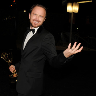 LOS ANGELES, CA - AUGUST 25: Actor Aaron Paul, winner of Outstanding Supporting Actor in a Drama Series for 'Breaking Bad,' attends the 66th Annual Primetime Emmy Awards Governors Ball held at Los Angeles Convention Center on August 25, 2014 in Los Angeles, California. (Photo by Kevin Winter/Getty Images)