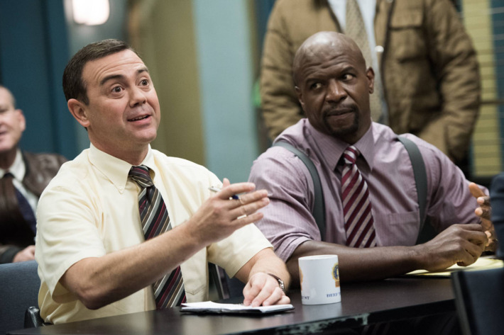 BROOKLYN NINE-NINE: Det. Boyle (Joe Lo Truglio, L) and Sgt. Jeffords (Terry Crews, R) listen in for their next assignment in the "The Wednesday Incident" episode of BROOKLYN NINE-NINE airing Sunday, Feb. 15 (8:30-9:00 PM ET/PT) on FOX. ?2015 Fox Broadcasting Co. CR: Eddy Chen/FOX