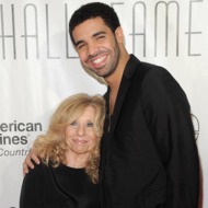 Rapper Drake (R) and Sandi Graham attend the Songwriters Hall of Fame 42nd Annual Induction and Awards at The New York Marriott Marquis Hotel - Shubert Alley on June 16, 2011.