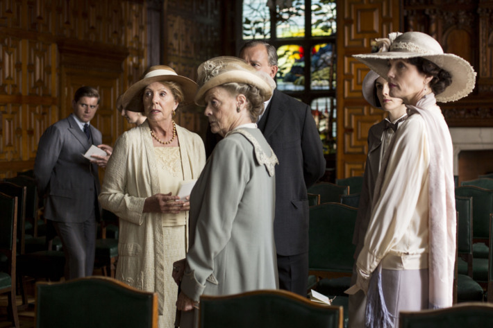 Downton Abbey Season 5 on MASTERPIECE on PBSPart EightSunday, February 22, 2015 at 9pm ETSomeone tries to derail Rose and Atticus’s happiness. Mrs. Patmore gets a surprise. Anna isin trouble. Robert has a revelation.Shown from left to right: Allen Leech as Tom Branson, Penelope Wilton as Isobel Crawley, Maggie Smith as Violet, Dowager Countess of Grantham, and Elizabeth McGovern as Cora, Countess of Grantham(C) Nick Briggs/Carnival Films 2014 for MASTERPIECEThis image may be used only in the direct promotion of MASTERPIECE CLASSIC. No other rights are granted. All rights are reserved. Editorial use only. USE ON THIRD PARTY SITES SUCH AS FACEBOOK AND TWITTER IS NOT ALLOWED.
