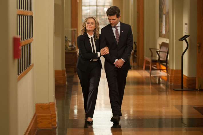 PARKS AND RECREATION -- "One Last Ride" Episode 712/713 -- Pictured: (l-r) Amy Poehler as Leslie Knope, Adam Scott as Ben Wyatt -- (Photo by: Colleen Hayes/NBC)