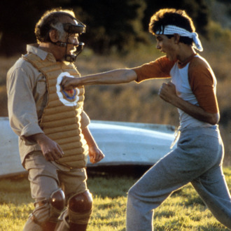 Ralph Macchio punches a dummy in a scene from the film 'The Karate Kid', 1984. (Photo by Columbia Pictures/Getty Images)