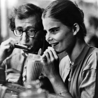 Woody Allen plays harmonica to Mariel Hemingway in a scene from the film 'Manhattan' 1979. (Photo by United Artists/Getty Images)