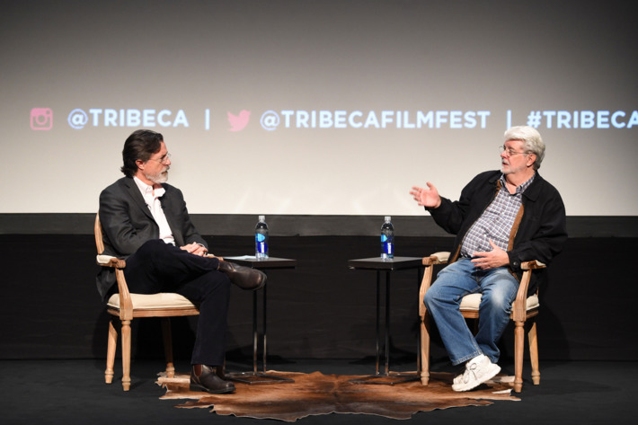 NEW YORK, NY - APRIL 17: George Lucas (R) and Stephen Colbert speak onstage at Tribeca Talks: Director Series: George Lucas With Stephen Colbert during the 2015 Tribeca Film Festival at BMCC Tribeca PAC on April 17, 2015 in New York City. (Photo by Jamie McCarthy/Getty Images for the 2015 Tribeca Film Festival )