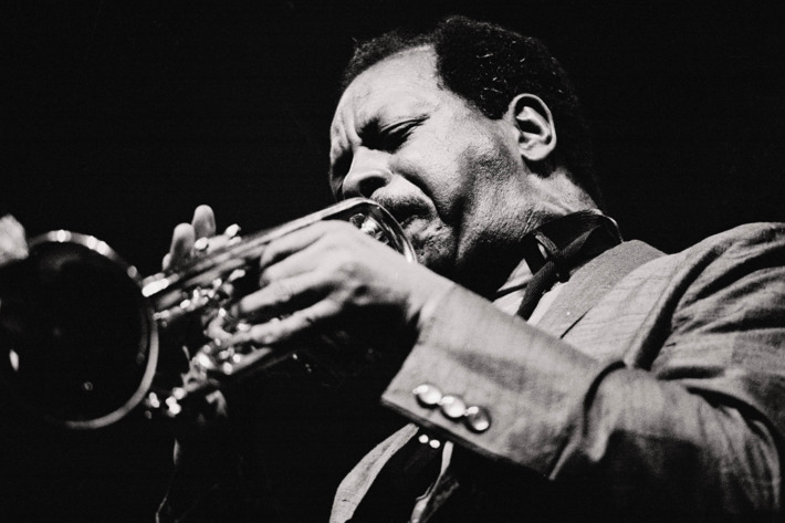 Ornette Coleman, jazz musician Coleman blowing the trumpet