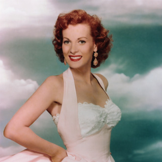 Maureen O'Hara Wearing a Pink Evening Gown
