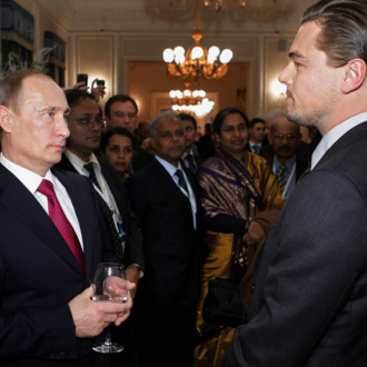 Russian Prime Minister Vladimir Putin (L