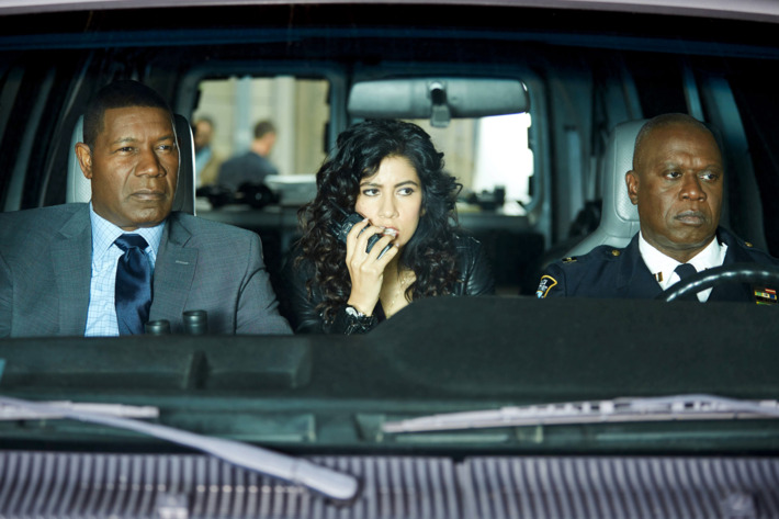 BROOKLYN NINE-NINE: L-R: Guest star Dennis Haysbert, Stephanie Beatriz and Andre Braugher in the "The Bureau" episode of BROOKLYN NINE-NINE airing Tuesday, April 12 (9:00-9:30 PM ET/PT) on FOX. ©2016 Fox Broadcasting Co. CR: John P. Fleenor/FOX