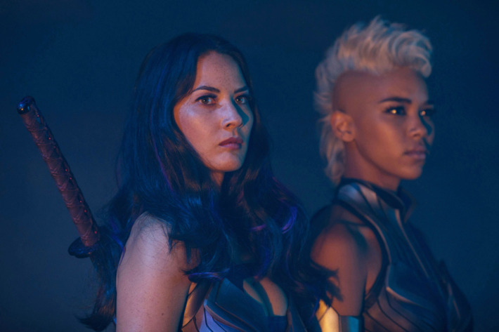 DF-13452 – Psylocke (Olivia Munn, left) and Storm (Alexandra Shipp) are two of Apocalypse’s Four Horsemen. Photo Credit: Alan Markfield.