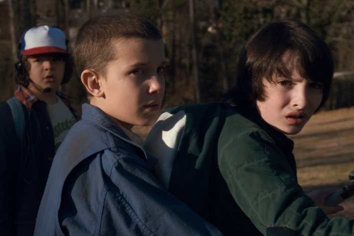 Gaten Matarazzo as Dustin, Millie Bobby Brown as Elle, Finn Wolfhard as Mike.