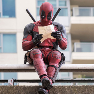DEADPOOLRyan Reynolds as Deadpool relaxes before leaping into battle.Photo Credit: David DolsenTM & © 2015 Marvel & Subs. TM and © 2015 Twentieth Century Fox Film Corporation. All rights reserved. Not for sale or duplication.