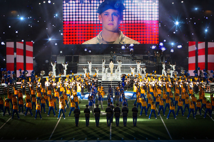 This image released by Sony Pictures shows Joe Alwyn, portraying Billy Lynn, on a screen in a scene from the film,