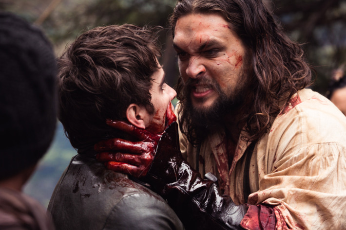 Michael Smyth (Landon Liboiron) and Declan Harp (Jason Momoa) in Frontier, the six-episode, one-hour drama from NETFLIX series currently shooting in Newfoundland, Canada. FRONTIER follows the chaotic and violent struggle to control wealth and power in the North American fur trade of the late 18th century, created by Rob Blackie and Peter Blackie, directed by Brad Peyton. Photo credit: Duncan de Young