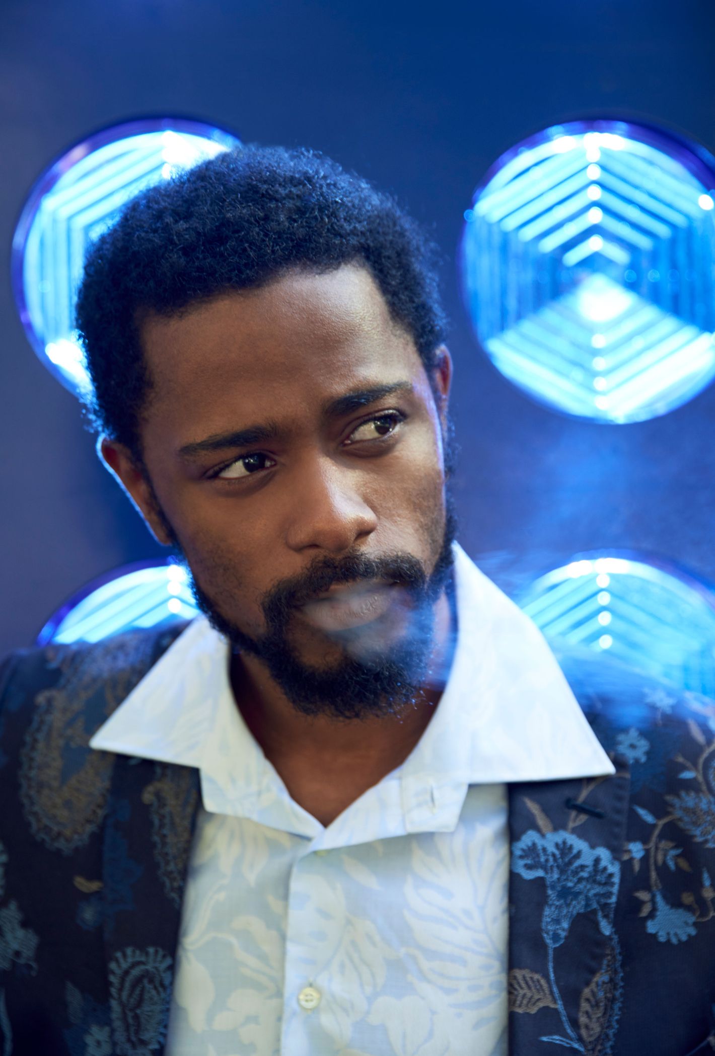 Keith Stanfield smoking a cigarette (or weed)
