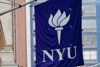 New York University flags hang outside buildings in New York