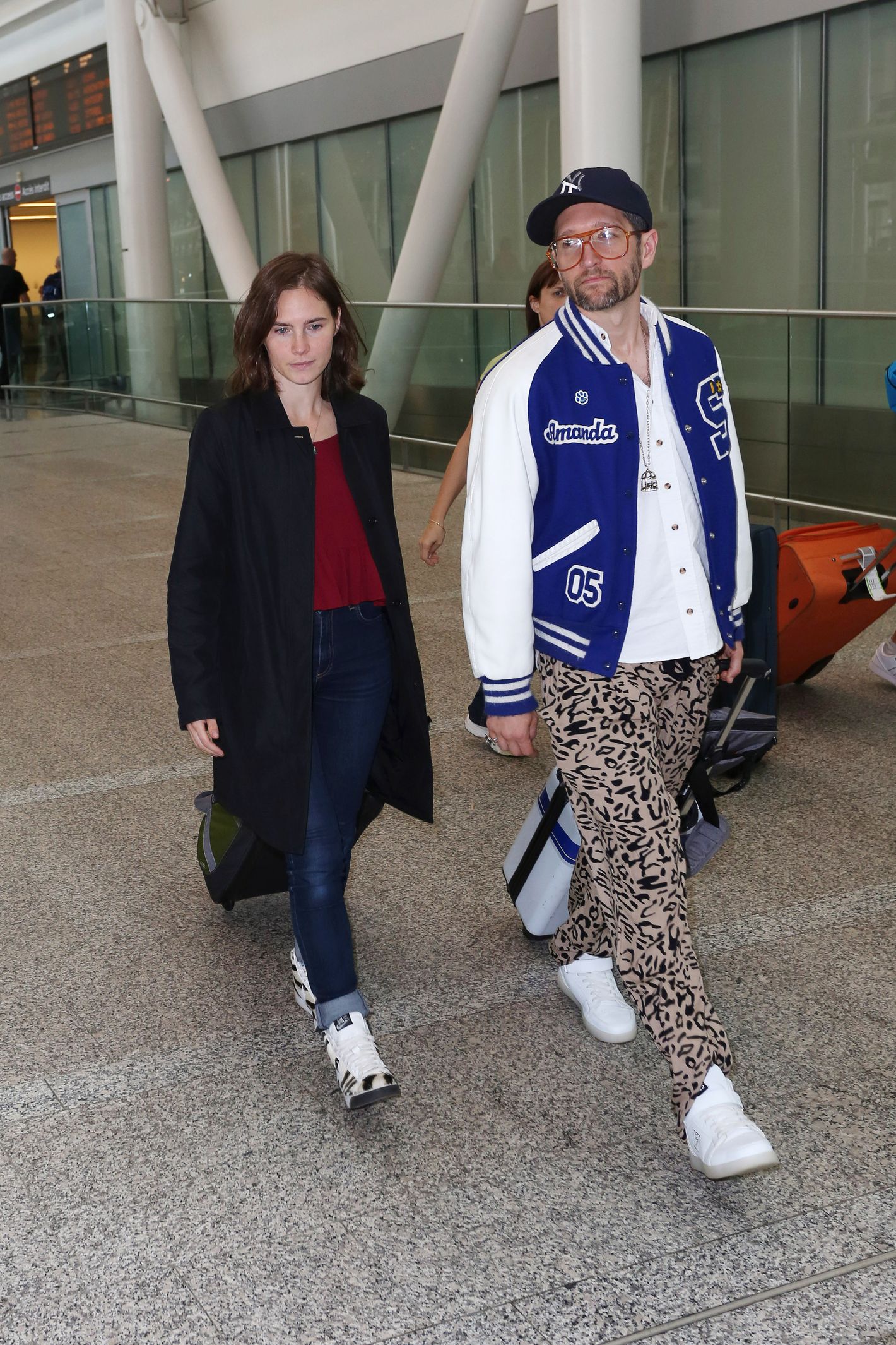 Amanda Knox and boyfriend Christopher Robinson arrives at Toronto International Airport during the 2016  Toronto International Film Festival.