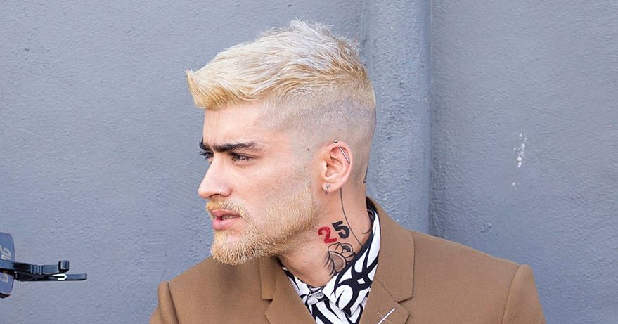 EXCLUSIVE: Zayn Malik shows off his latest head tattoos and new blonde hair and beard during a video shoot in Miami, Florida.