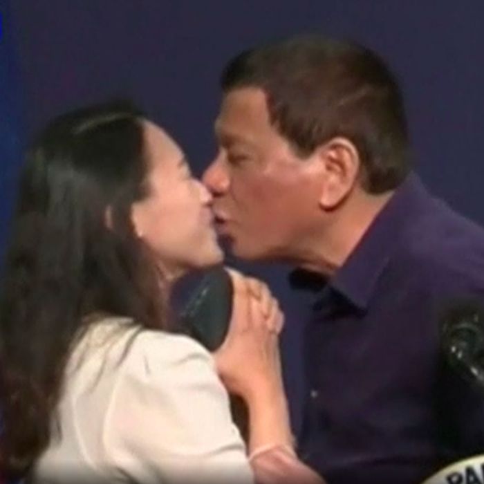 Philippines President Slammed For Kissing Woman Onstage