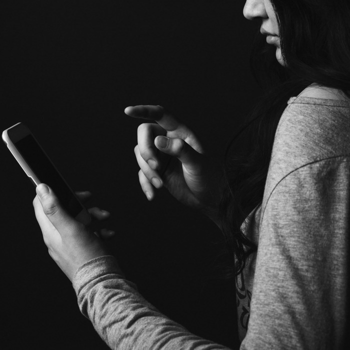 Woman texting.