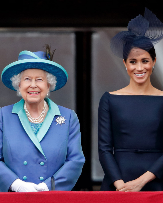 Queen Elizabeth and Meghan Markle, both in hats.